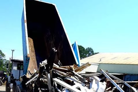 Truck dumping scrap metal